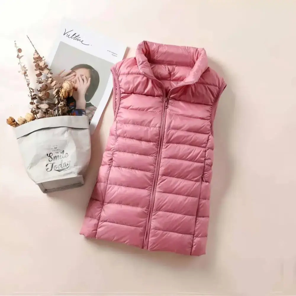 Doudoune sans manche plume rose ultra-légère avec coupe cintrée et fermeture éclair frontale