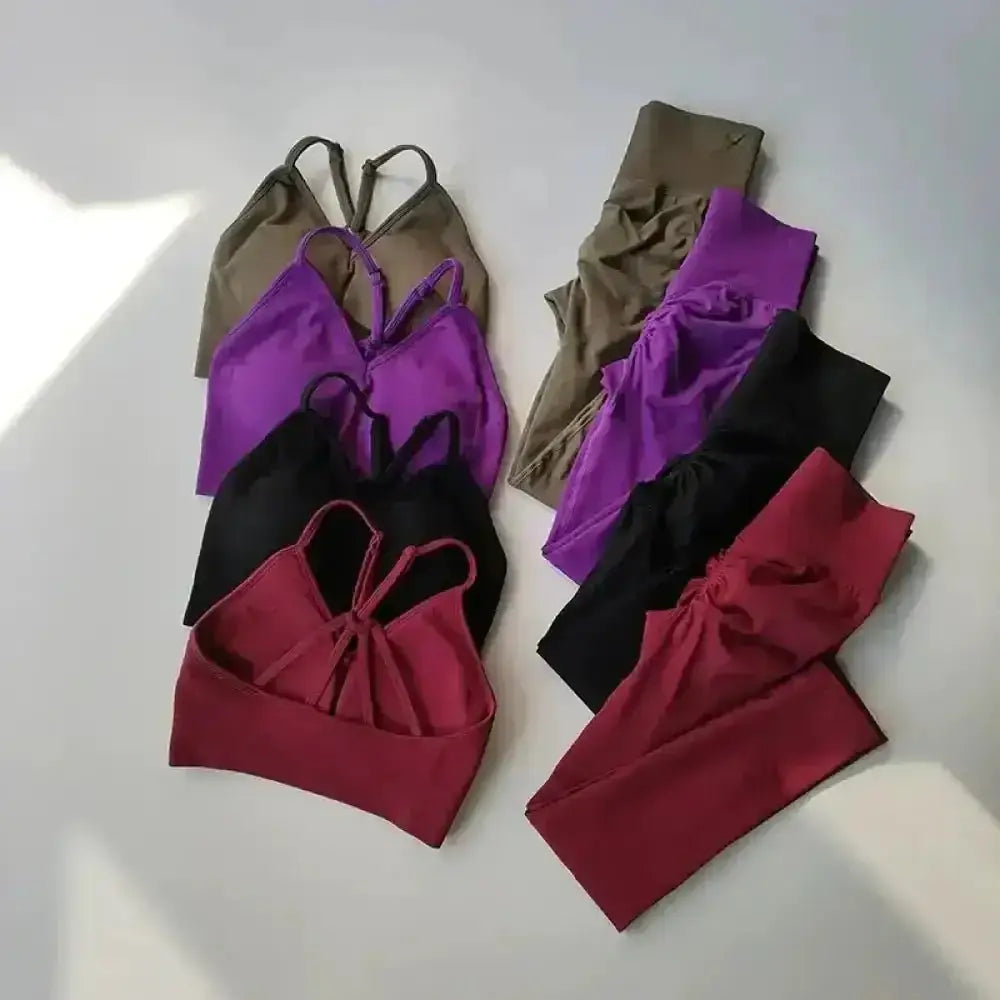 Ensemble sport infinite legging et top seamless sculptant femme en ensembles assortis olive, violet, noir et bordeaux avec détails croisés et noués