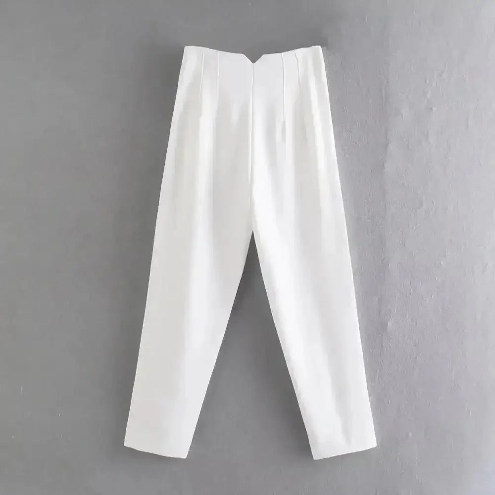 Pantalon tailleur victoire blanc taille haute avec plis subtils à la taille et coupe ajustée minimaliste